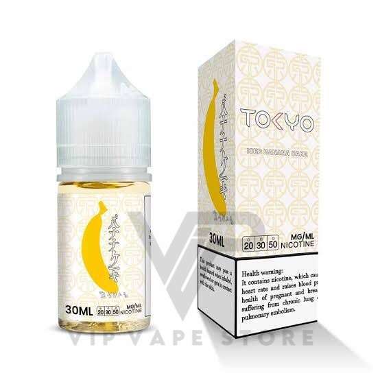 Tokyo salt Iced banana cake 30ml Indulge in the delectable featuring a light and fluffy sponge cake generously filled with the luscious goodness of real, fresh banana custard cream. This delightful combination promises a heavenly experience, capturing the essence of a delectable banana-filled treat. Savor the perfect blend of sweetness and creaminess, as each inhale takes you on a journey through the exquisite flavors of this unique and irresistible. review: Brand Name: Tokyo nicotine flavors VG/PG: 50%/50% Size: 30 ml Nicotine Strength:  20g/35mg/50mg